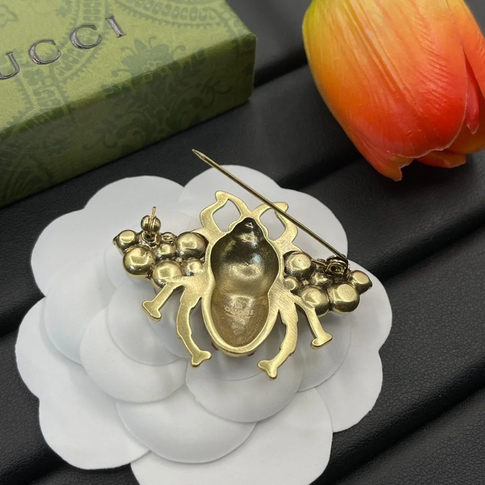 Gucci Gold-Tone Bee Brooch with Pearls and Red & Blue Enamel